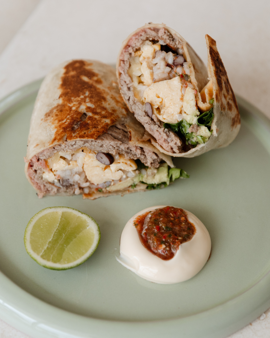 Beef Mince Breakfast Burrito with scrambled egg, avocado, and salsa roja