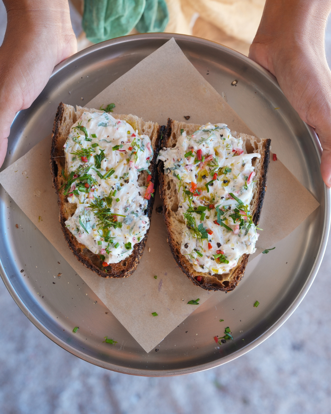 A slice of toasted sourdough topped with Blue Swimmer crab, herbs, chilli and a squeeze of lemon.
